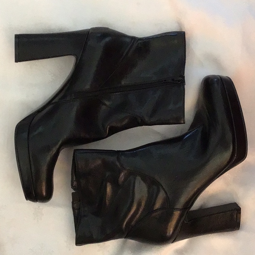 Black leather booties.